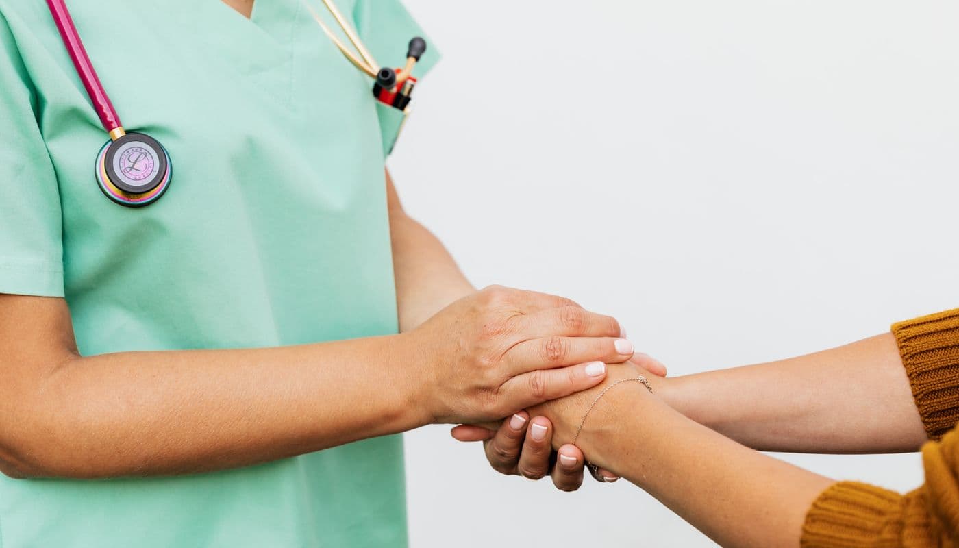 A licensed advisor shaking hands with a satisfied member